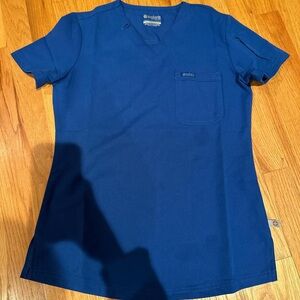 Navy blue women’s scrub top